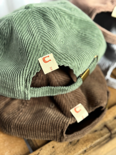 the “Signature Pin” hat