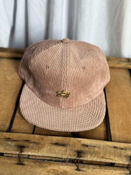 the “Signature Pin” hat