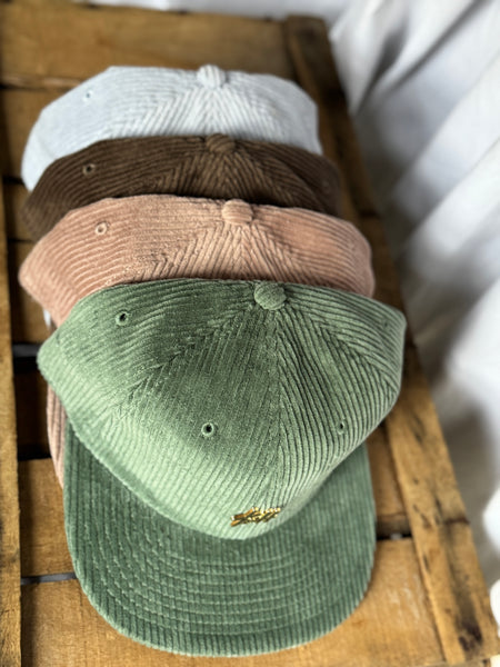 the “Signature Pin” hat