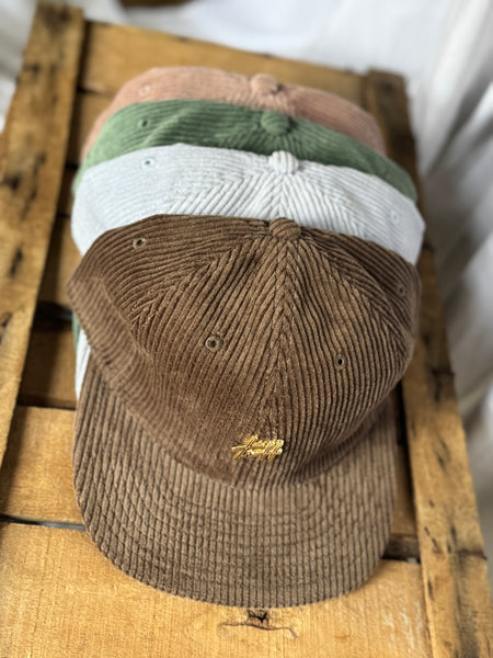 the “Signature Pin” hat