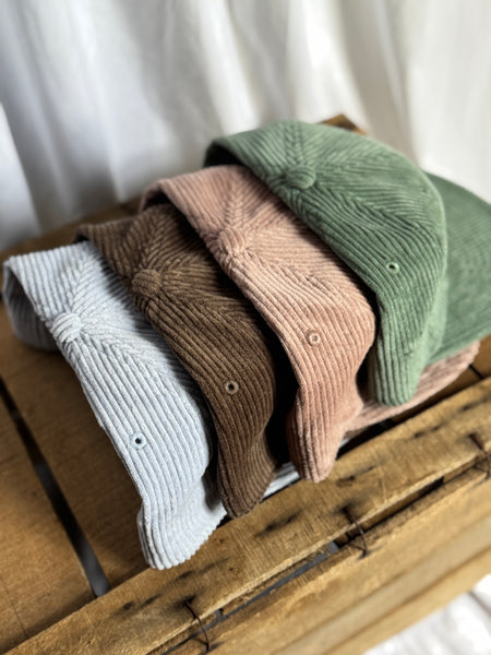 the “Signature Pin” hat