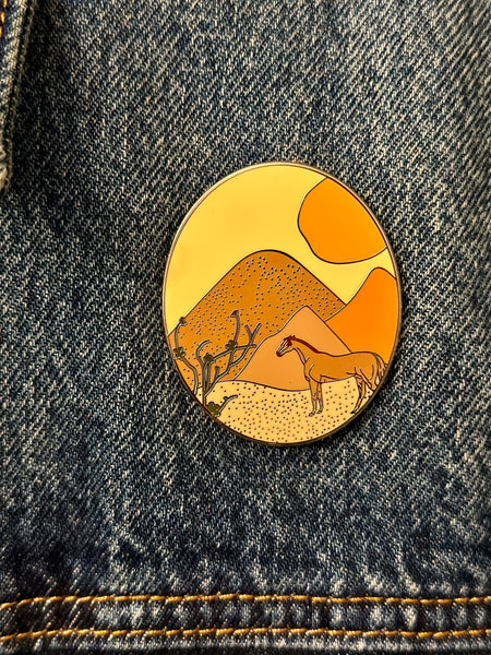 the "Mountain Horse" enamel pin