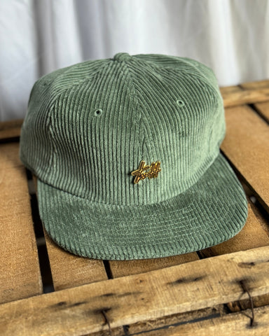 the “Signature Pin” hat