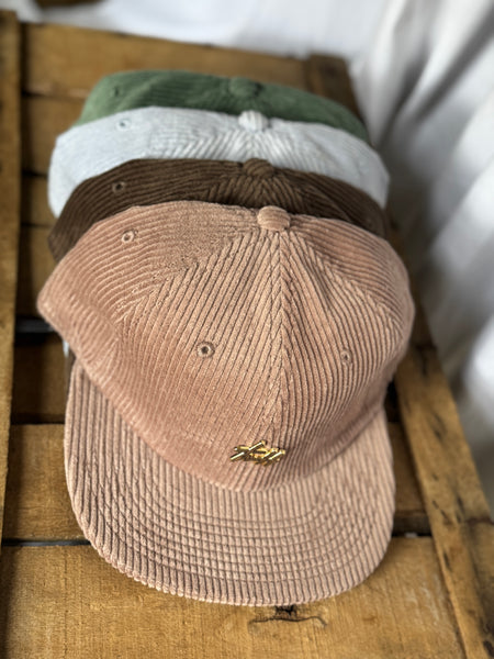 the “Signature Pin” hat