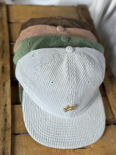 the “Signature Pin” hat