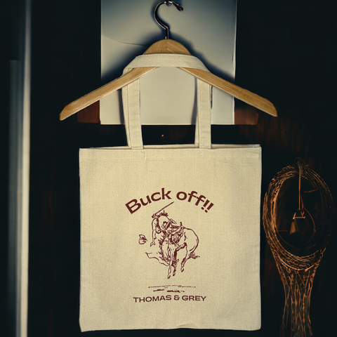 the “BUCK OFF” tote