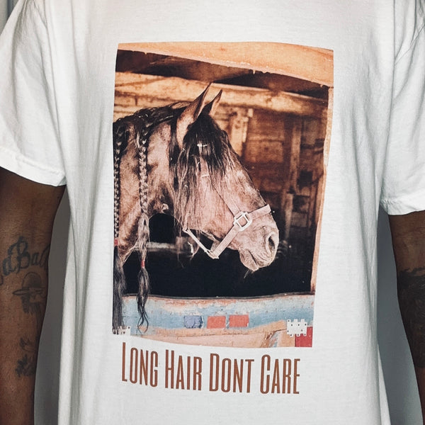 the “Long Hair Dont Care” tee